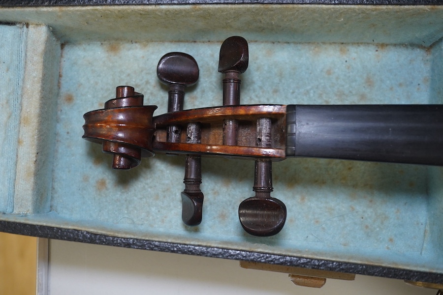 A late 19th century French Chipot-Vuillaume violin, with Edward Withers case, back measures 36cm.